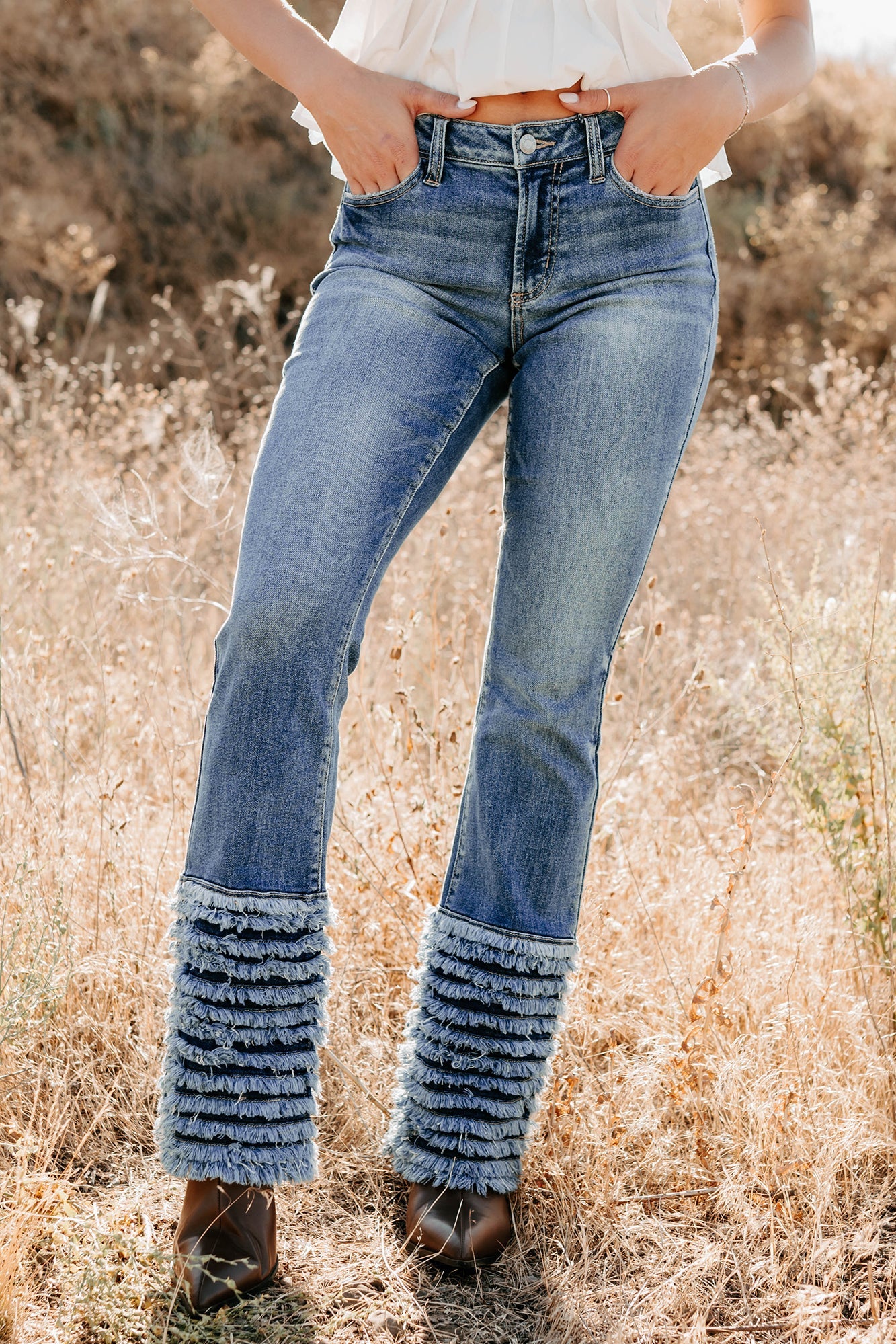 Vera Mid Rise Frayed Hem Cello Flare Jeans (Medium)