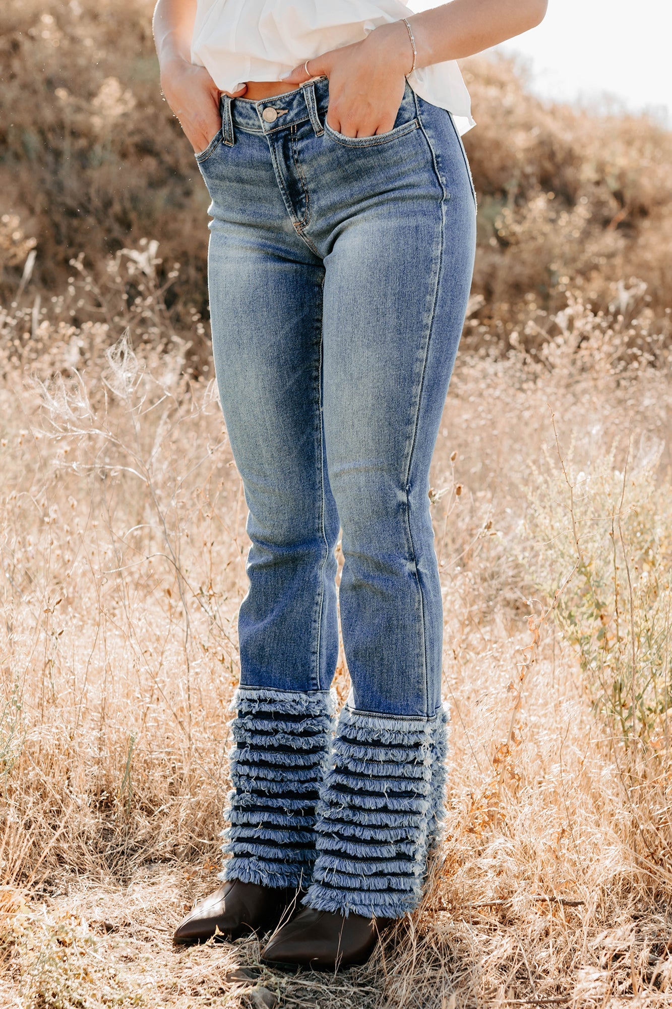 Vera Mid Rise Frayed Hem Cello Flare Jeans (Medium)